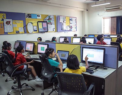 Modern computer lab at Modern Academy CBSE School in Namakkal with students learning digital skills